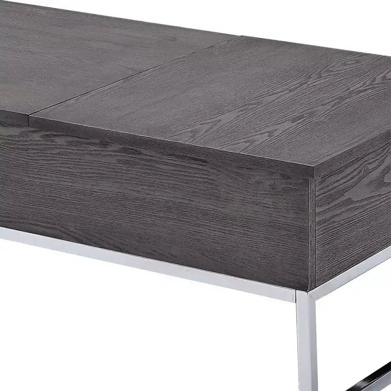 Table basse en bois avec deux plateaux relevables et des pieds traîneaux en métal, gris et argent
