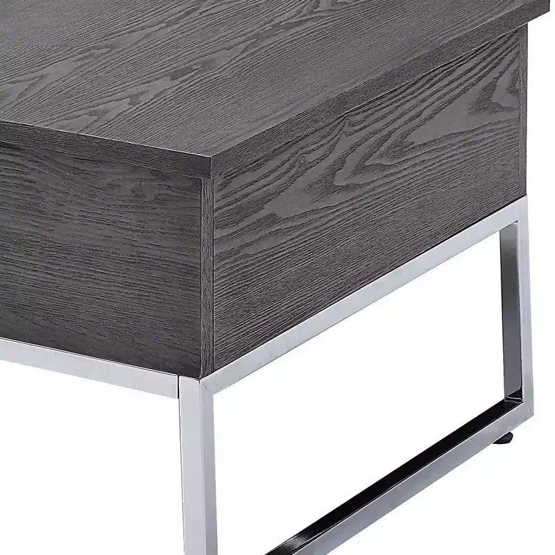 Table basse en bois avec deux plateaux relevables et des pieds traîneaux en métal, gris et argent